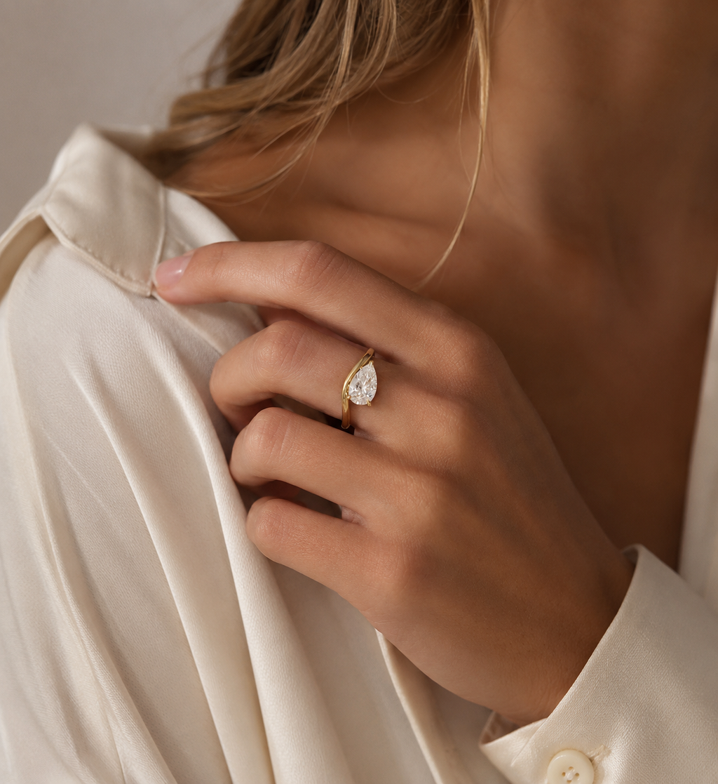 Aurora Pear Solitaire Ring