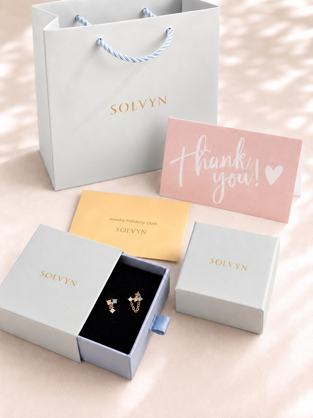 SOLVYN gift box with asymmetric multicolour earrings