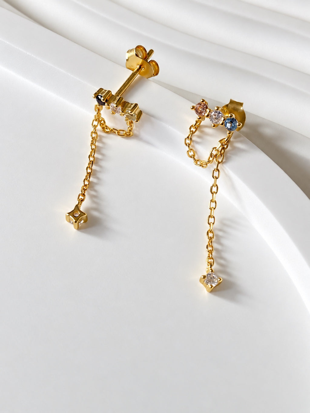 Back view of chain drop earrings showing posts and butterfly backs